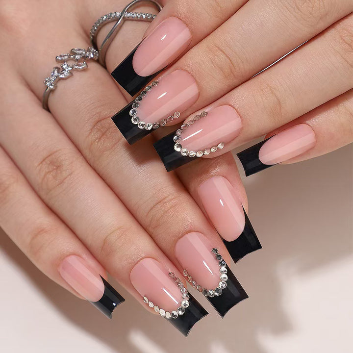 Artificial nail set with elegant tips and glitter accents Stornfield
