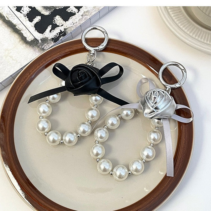 Elegant Pearl and Leather Charm Keychain Stornfield