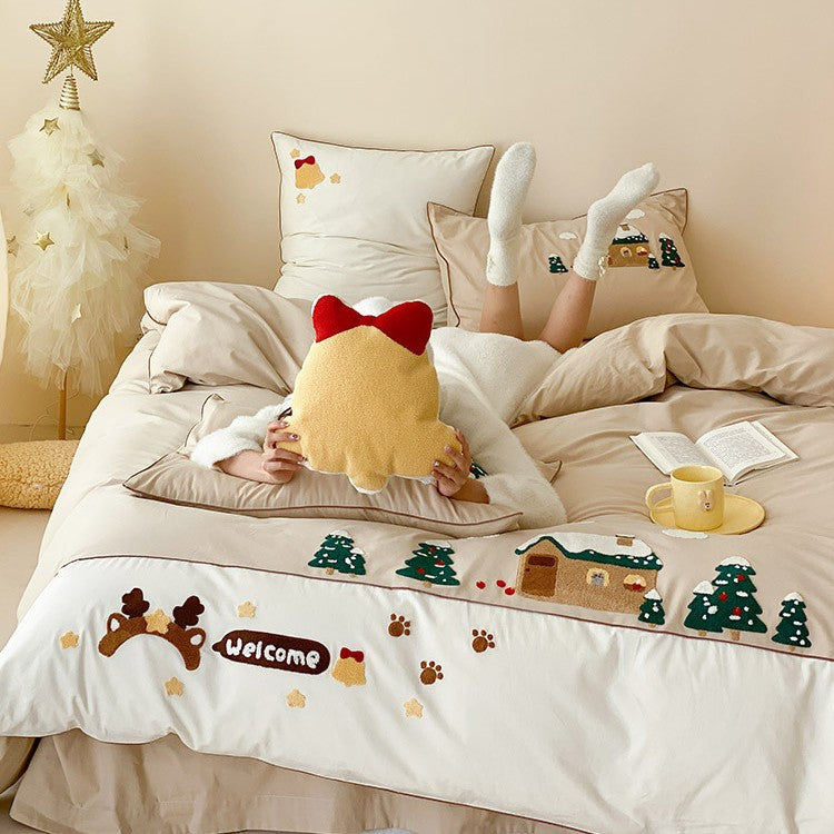 Cozy bedding set with embroidered winter house and Christmas tree motifs