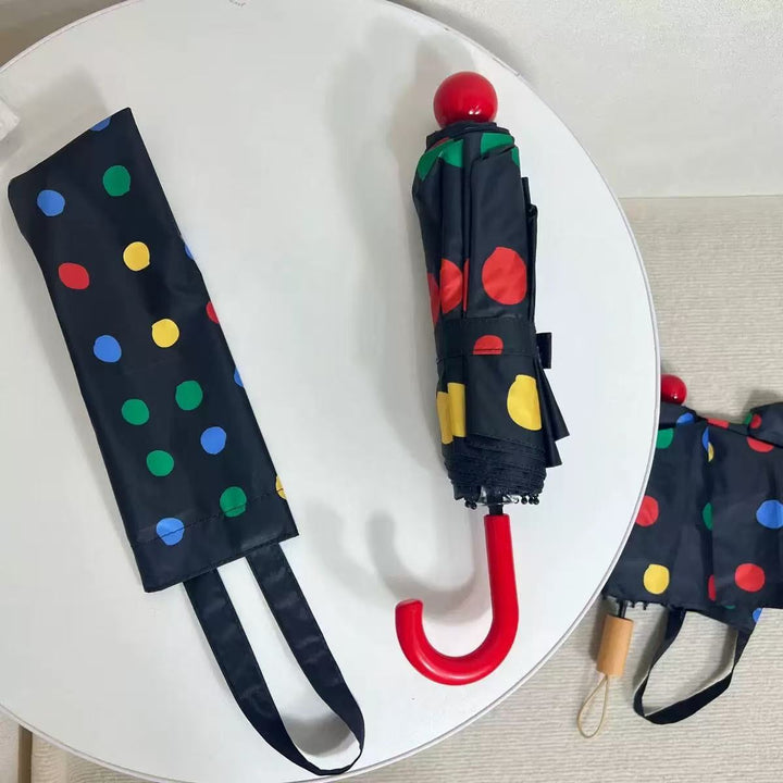 Ladies designer foldable umbrella with colorful polka dot pattern Stornfield