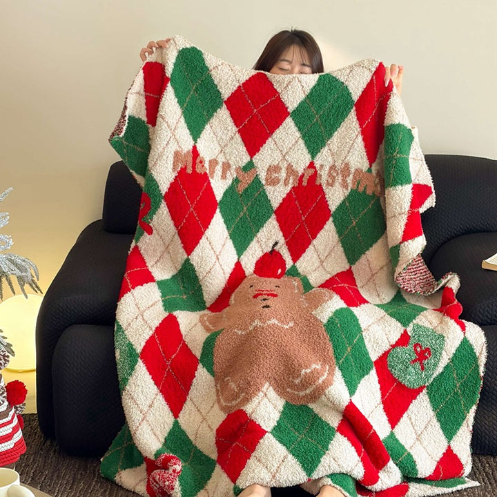 Cozy blanket in knit look with large animal face and soft terry surface