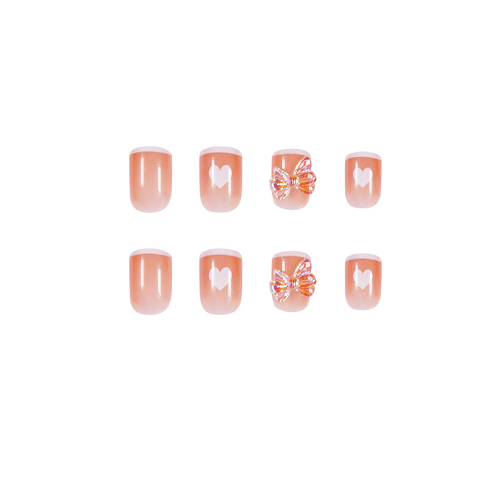 Nail art with heart and butterfly motifs Stornfield
