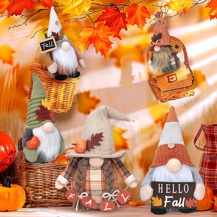 Autumn handmade decorative gnome figure with knitted hat, felt leaf application and pumpkin detail