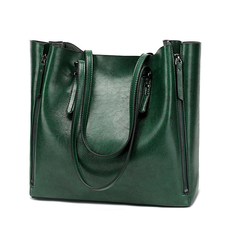 Versatile Leather Tote Bag with Zippered Pockets