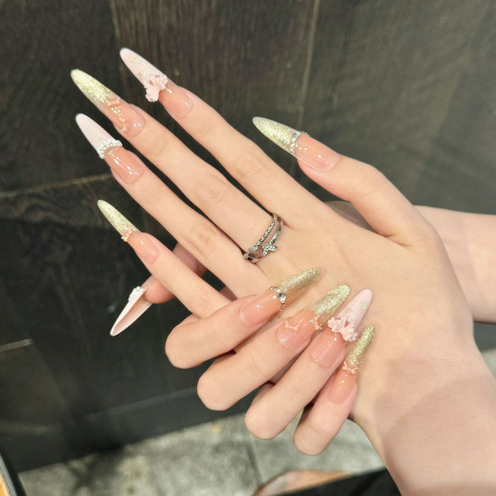 Elegant Stiletto Press-On Nail Set with Floral and Glitter Accents