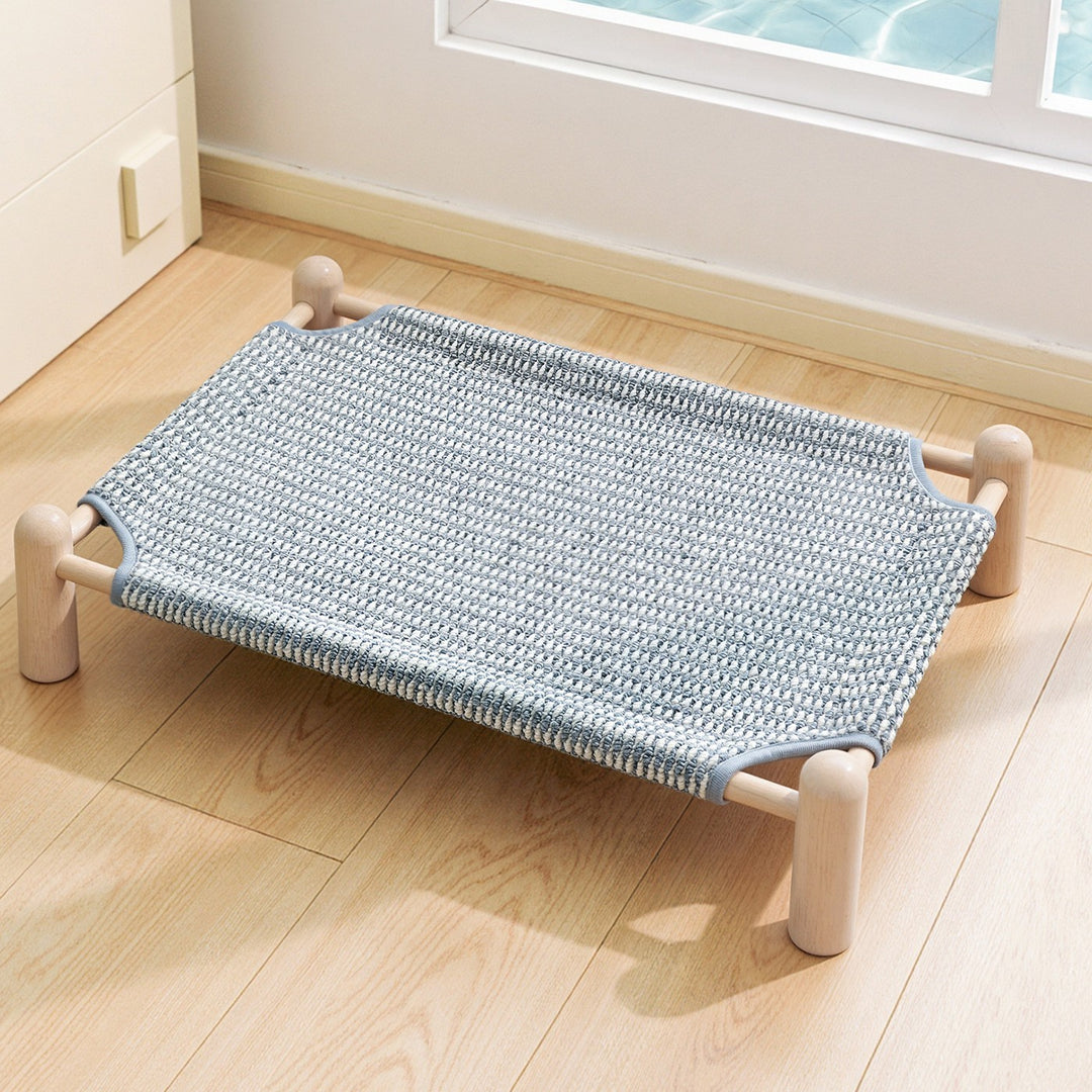 Unisex nan raised wooden pet bed with breathable, woven cover Stornfield