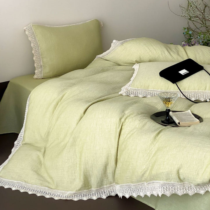 Luxurious linen bedding set with lace trim and pillowcases