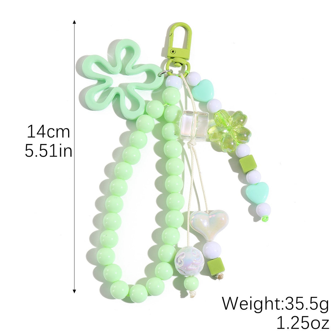 Playful keychain with flower and butterfly details Stornfield