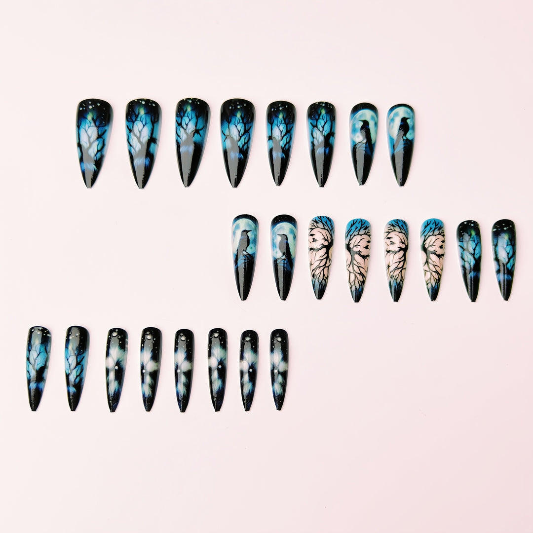 Creative artificial nails with mystical moon and crow design Stornfield