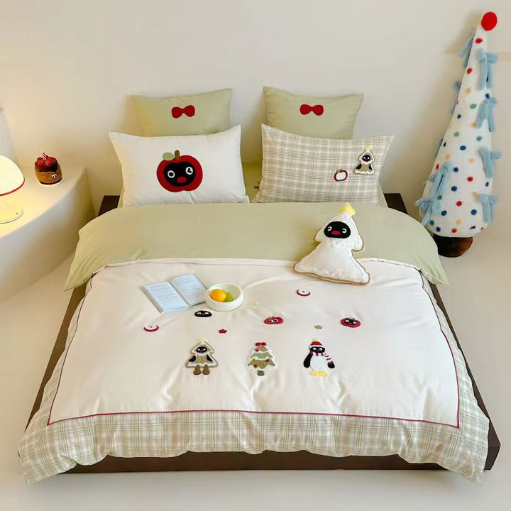 Children's bedding set with appliquéd winter figures and checkered ruffle
