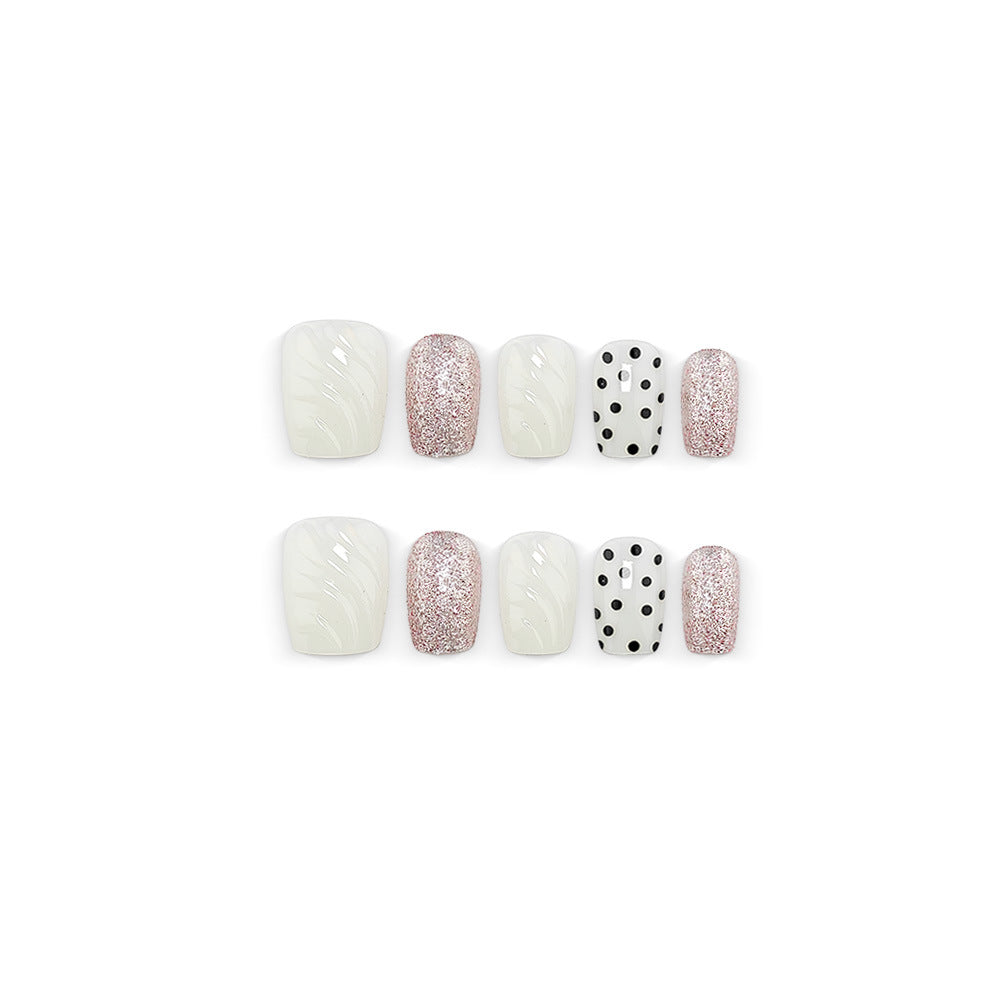 Artificial nails with diverse patterns and glitter effects Stornfield