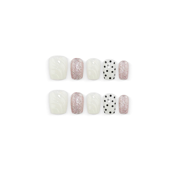 Artificial nails with diverse patterns and glitter effects Stornfield