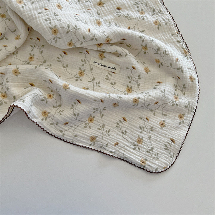Unisex versatile muslin blanket with floral accents Stornfield