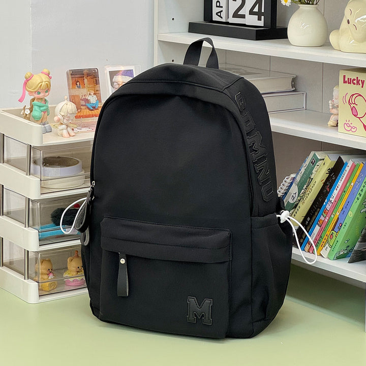 Stylish Canvas Backpack with Plush Keychain Stornfield