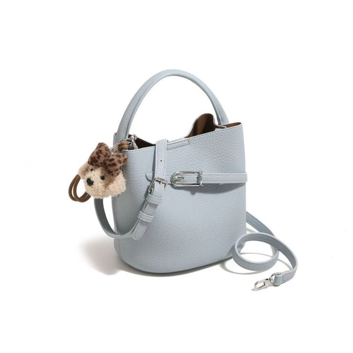 Chic Pebbled Leather Handbag with Cute Charm