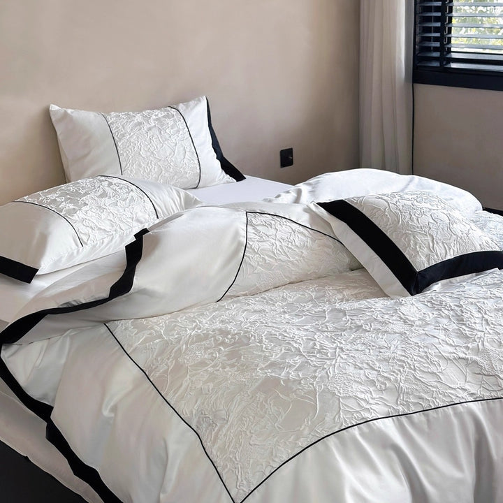 Textured Floral Matelassé Duvet Cover Set with Contrast Piped Border and Euro Shams