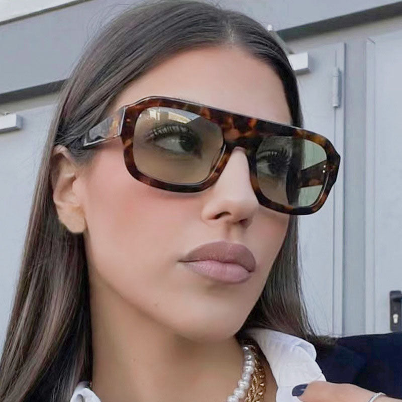 Women’s stylish square sunglasses with eye-catching animal print design Stornfield
