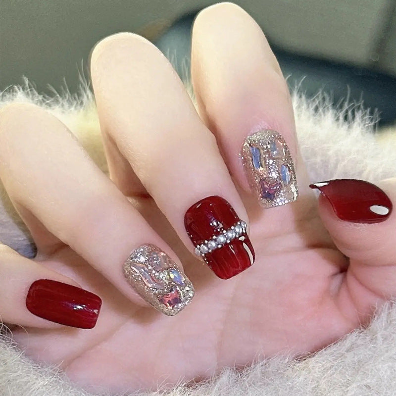 Glamorous artificial nail set with sparkling 3D applications and elegant embellishments Stornfield
