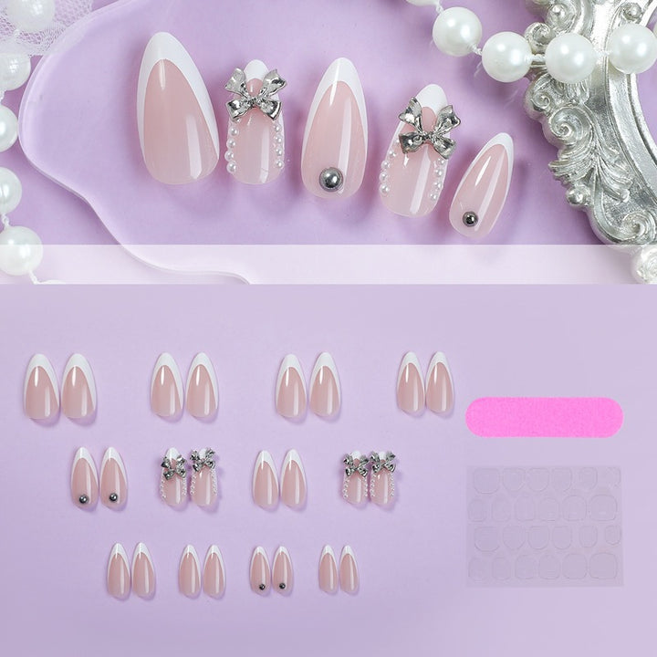 Acrylic nail set with elegant decorative embellishments Stornfield