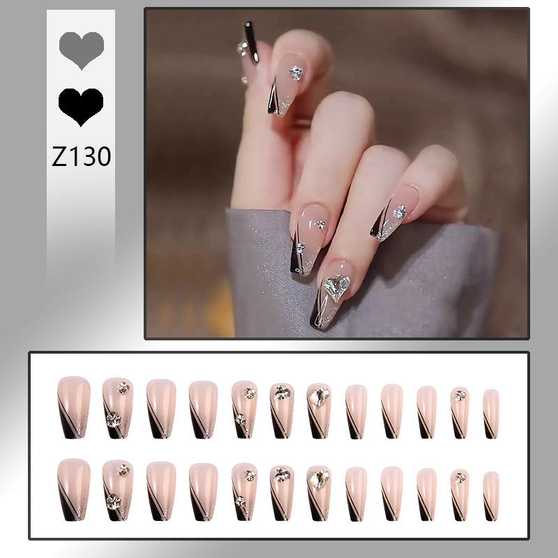 Nail art set with elegant wave patterns and delicate pearl accents Stornfield