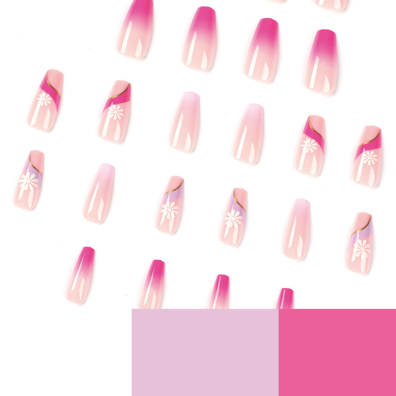 Artful nail extensions with colorful ombre design and floral accents Stornfield