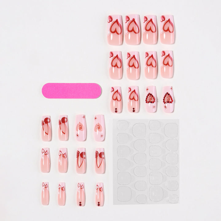 Artificial nail set with romantic heart designs and sparkling rhinestone decorations Stornfield