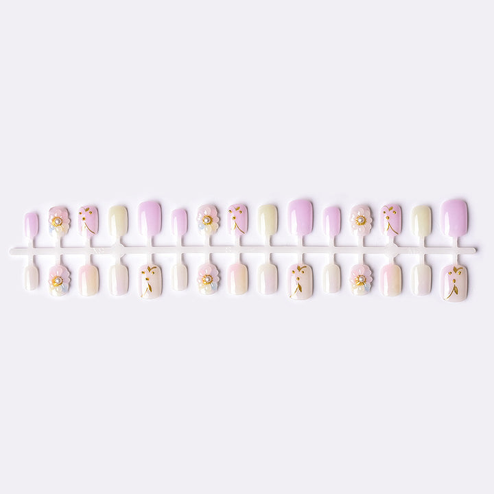 Floral-Themed Press-On Nail Art Set with Pearl Embellishments Stornfield