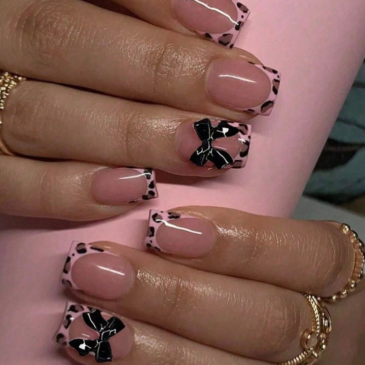 Artificial nail set with elegant 3D bows and leopard design Stornfield