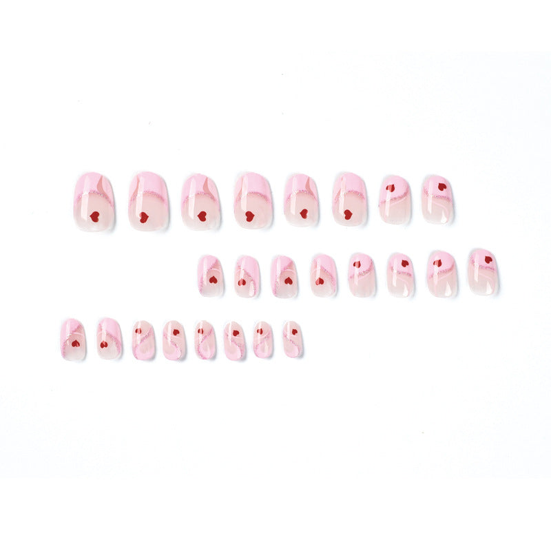 Artistic Nail Extensions with Heart Motif Stornfield