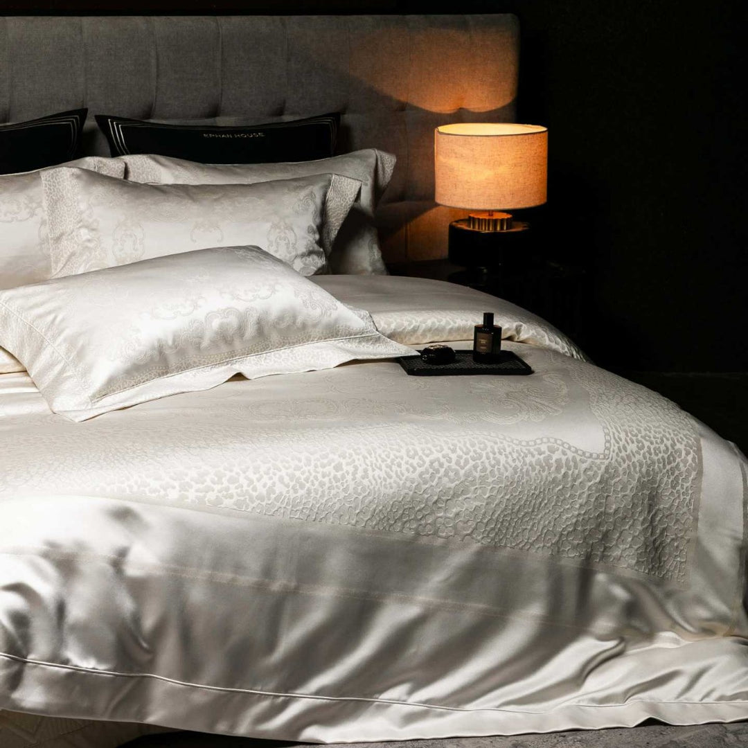 Jacquard bedding set made of cotton satin with embossed medallion and pillow ruffle