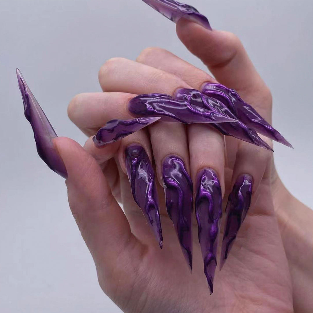 Creative Stiletto Nail Art with Blood Red Accents Stornfield