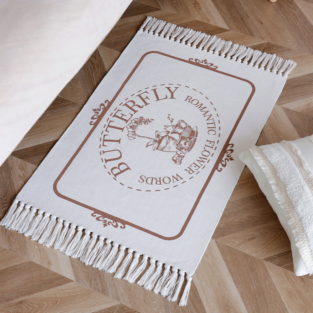 Woven table runner with botanical bird print and decorative fringes