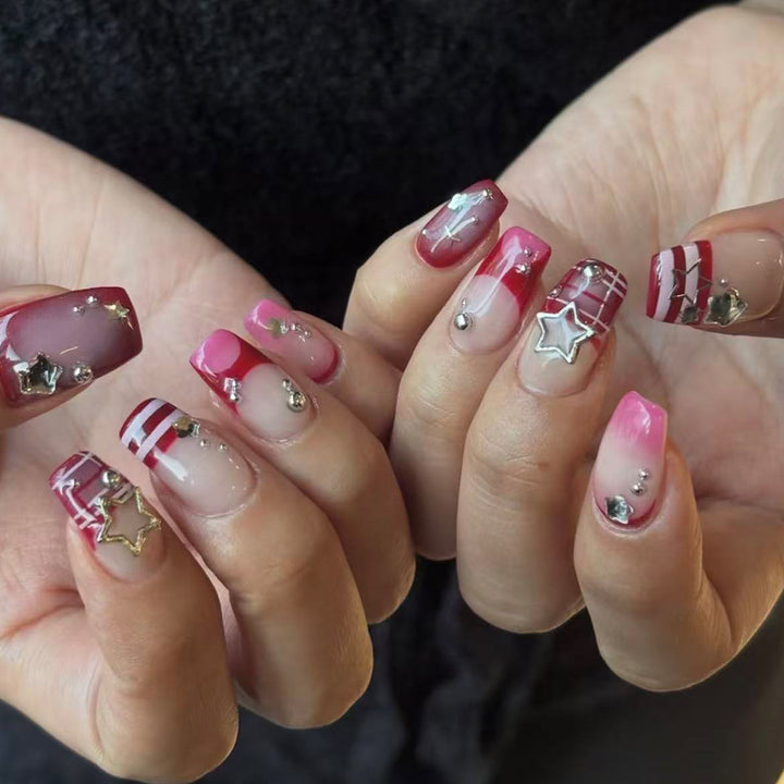 Artificial fingernails with handcrafted star decorations Stornfield