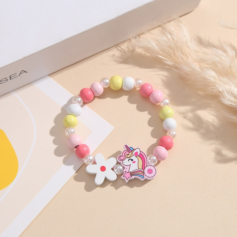Playful children's bracelet with unicorn and flower motif Stornfield