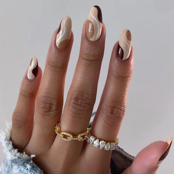 Artificial nail extensions in elegant wave design Stornfield