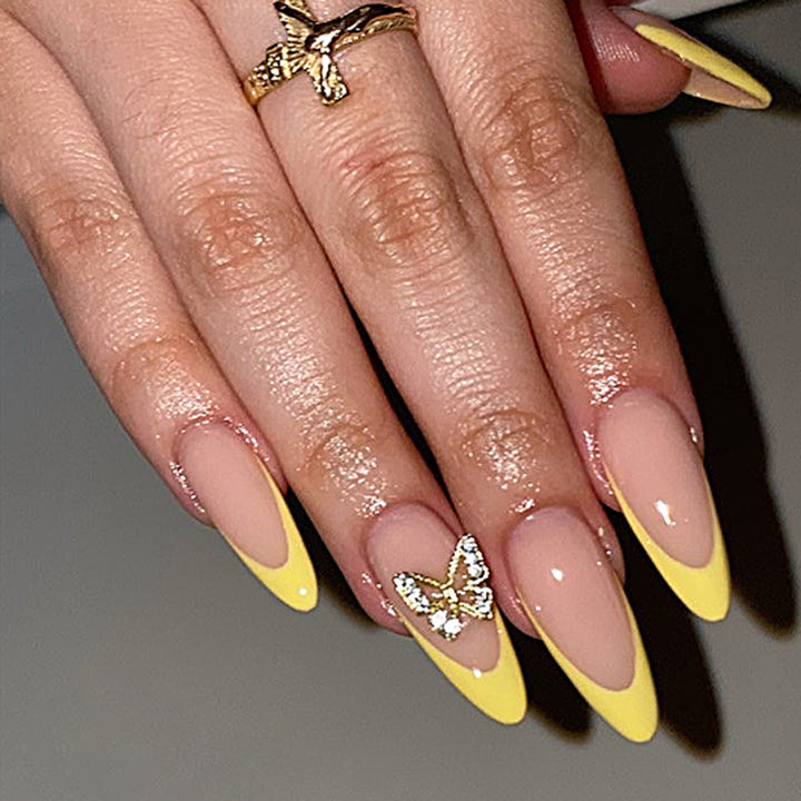 Artful stiletto nails with glamorous butterfly design Stornfield