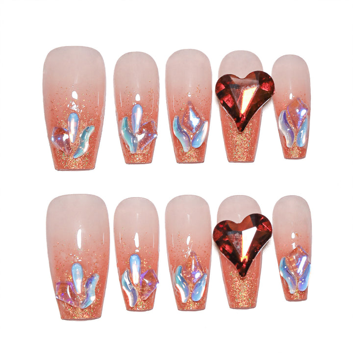 Artistic acrylic nails with heart design and sparkling accents Stornfield