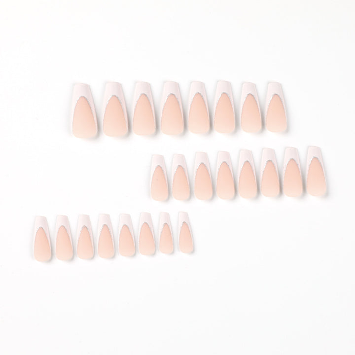 Lacquered stiletto nails with glitter decoration Stornfield