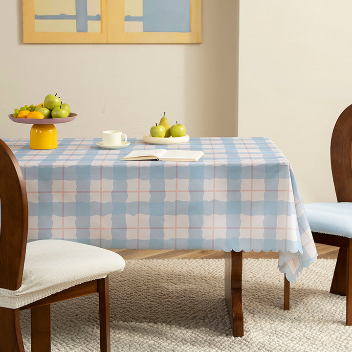 Wipeable tablecloth with star pattern and wavy hem Stornfield