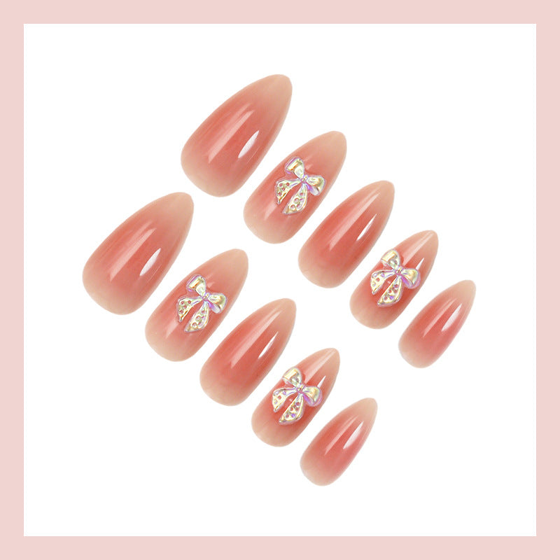 Nail set with elegant ombre effects and sparkling accents Stornfield
