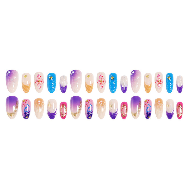 Creative nail art set with floral and glamorous embellishments Stornfield