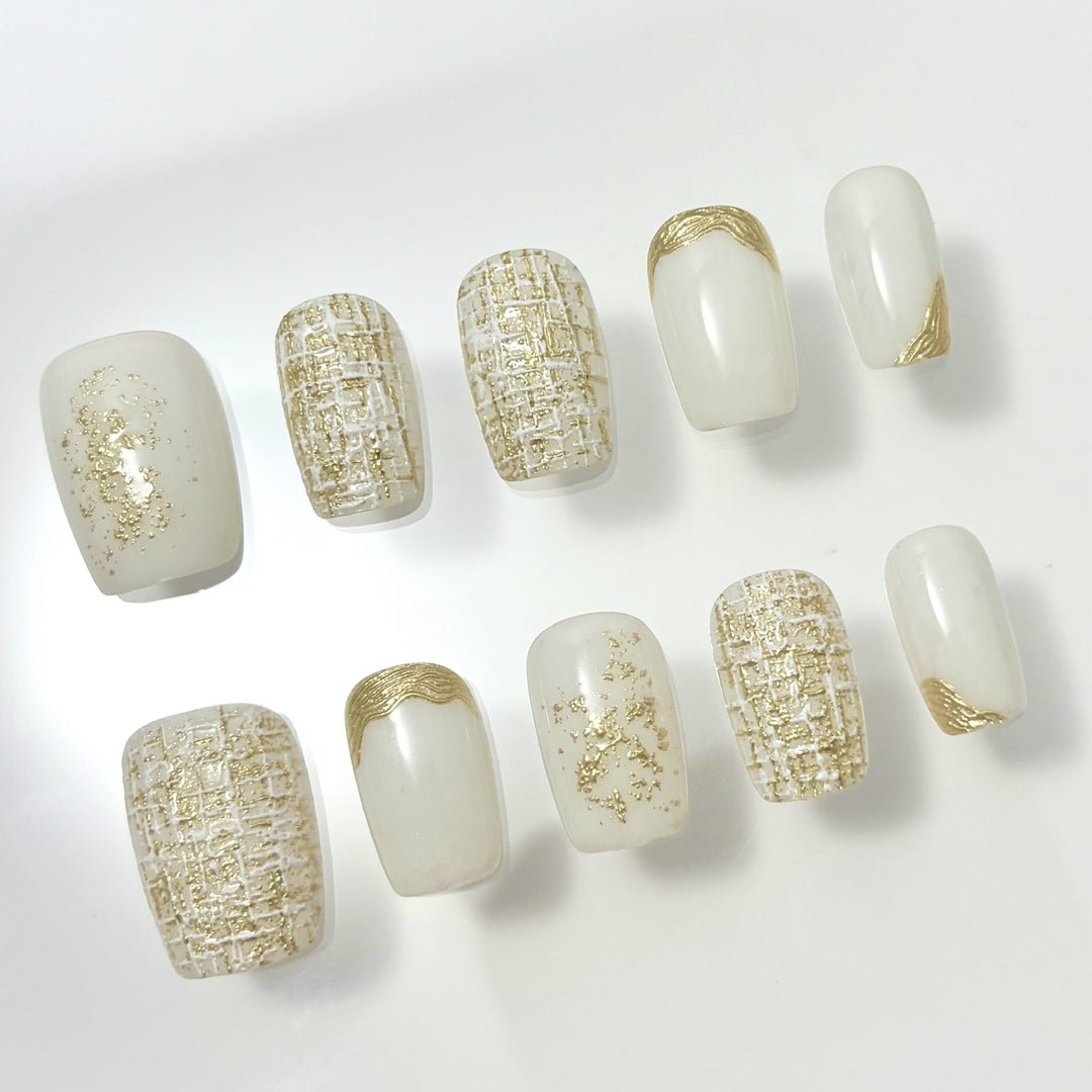 Elegant Press-On Nail Set with Decorative Gold Accents