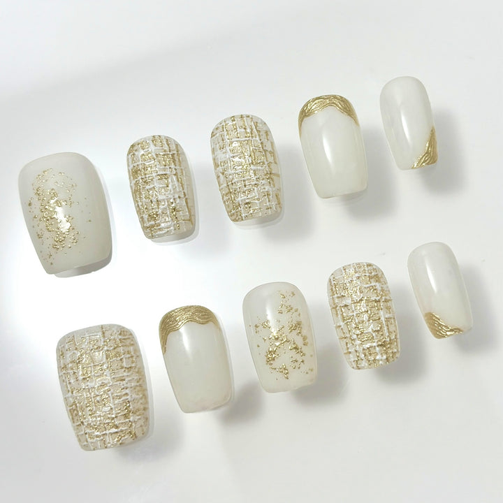 Elegant Press-On Nail Set with Decorative Gold Accents