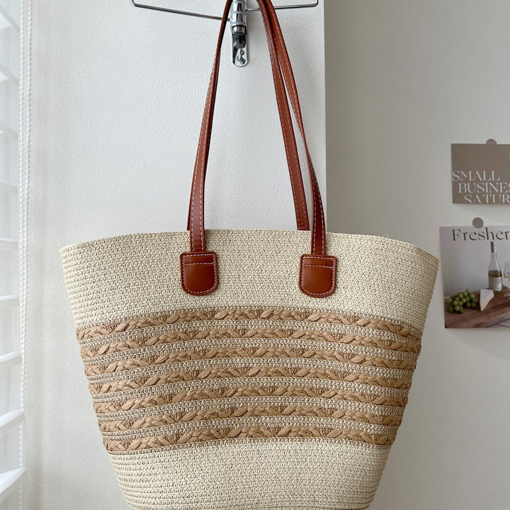 Handcrafted wicker bag with elegant leather accents Stornfield