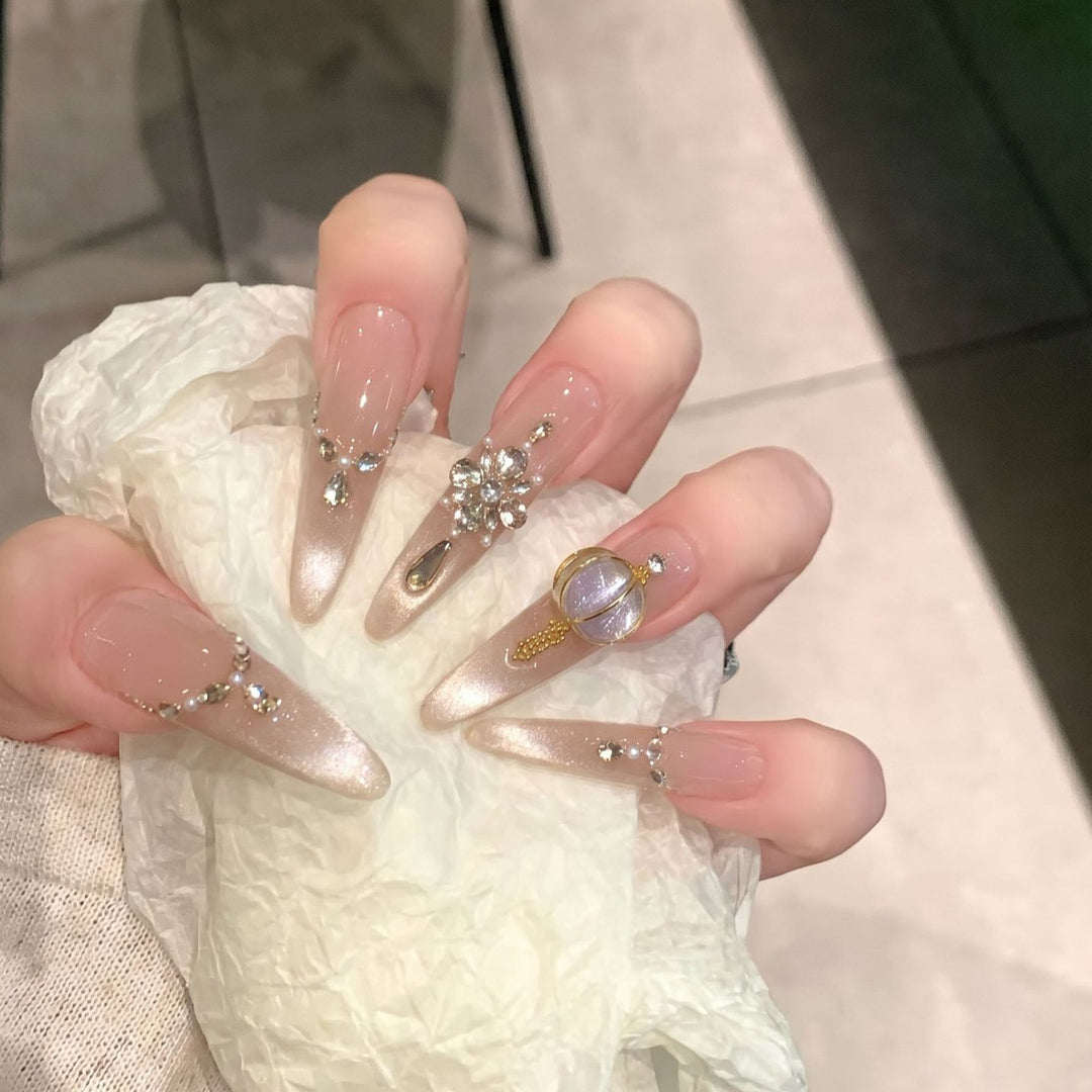 Decorative Stiletto Press-On Nail Set with Elegant Gemstone Embellishments Stornfield