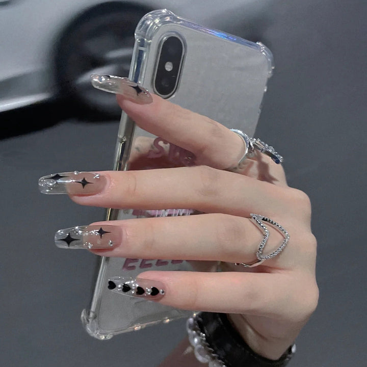 Trendy artificial nails with star design Stornfield