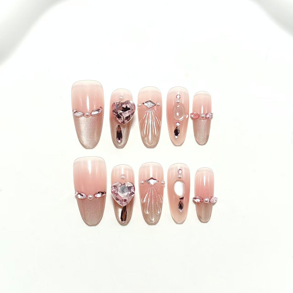 Artificial nails with sparkling heart and rhinestone accents Stornfield