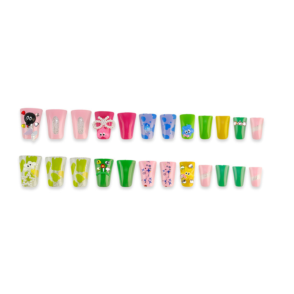 Creative press-on nails with playful 3D designs Stornfield