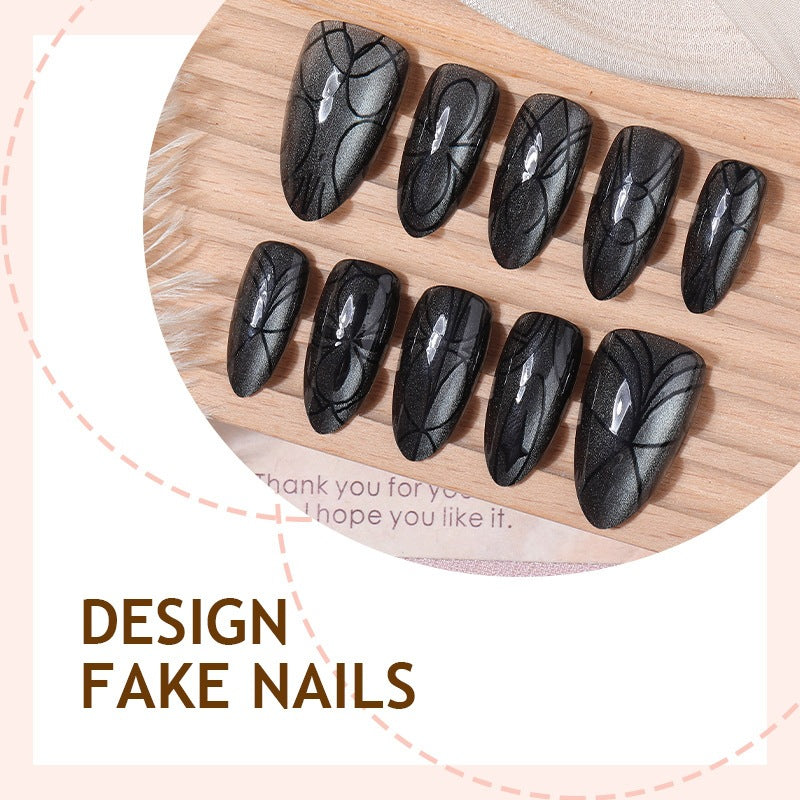 Acrylic nail set with creepy spider design and glitter accents Stornfield