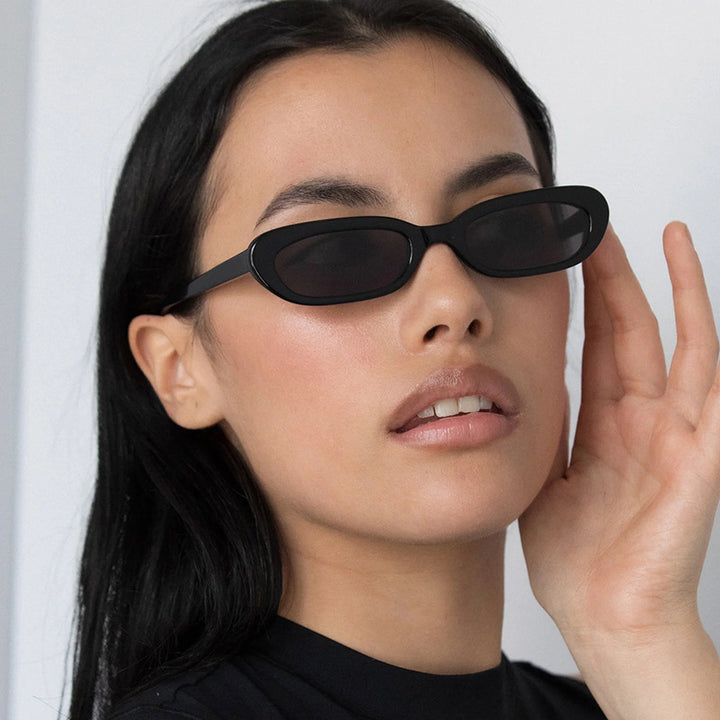 Women's trendy cat-eye sunglasses with transparent plastic frame and UV protection Stornfield